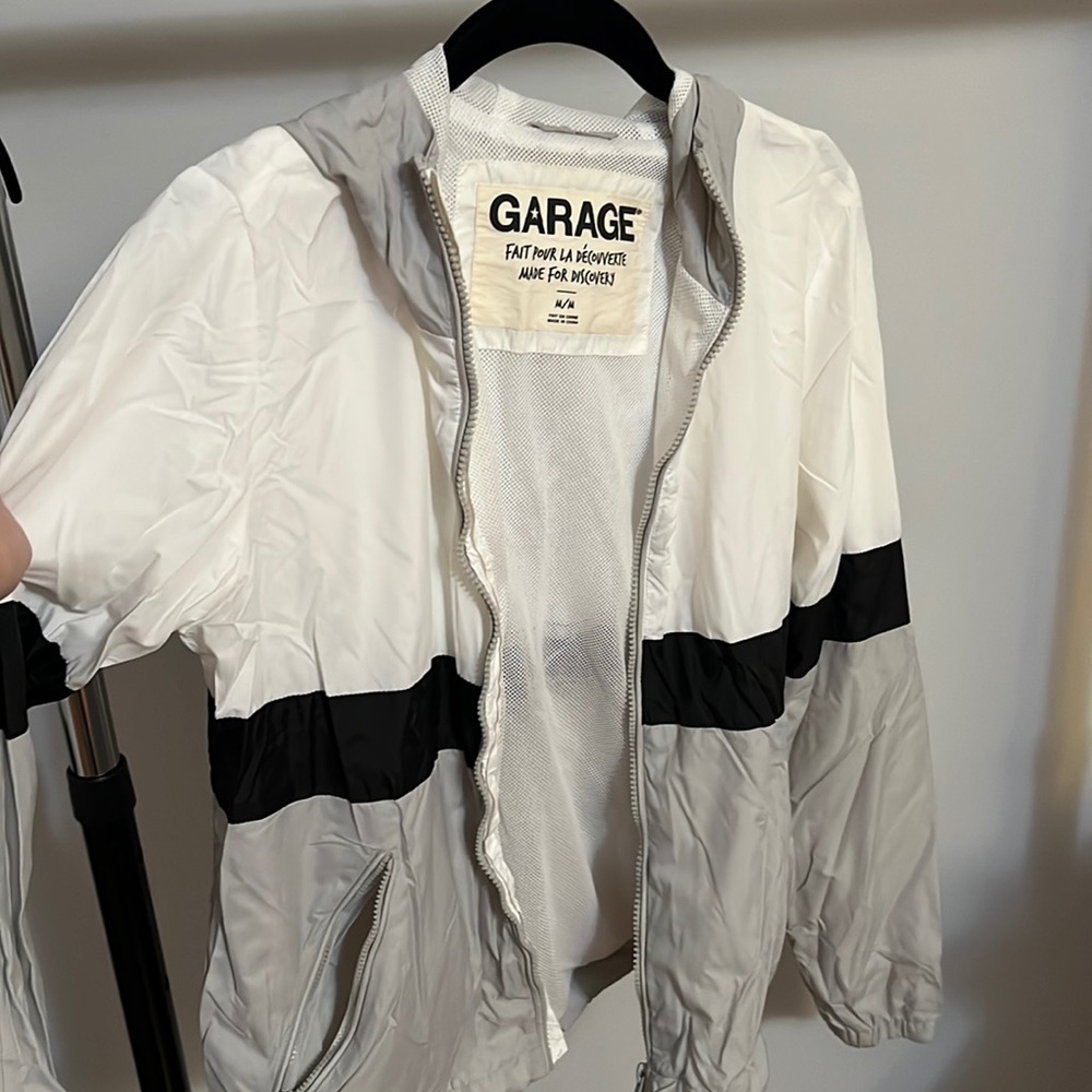 White gray and black garage windbreaker